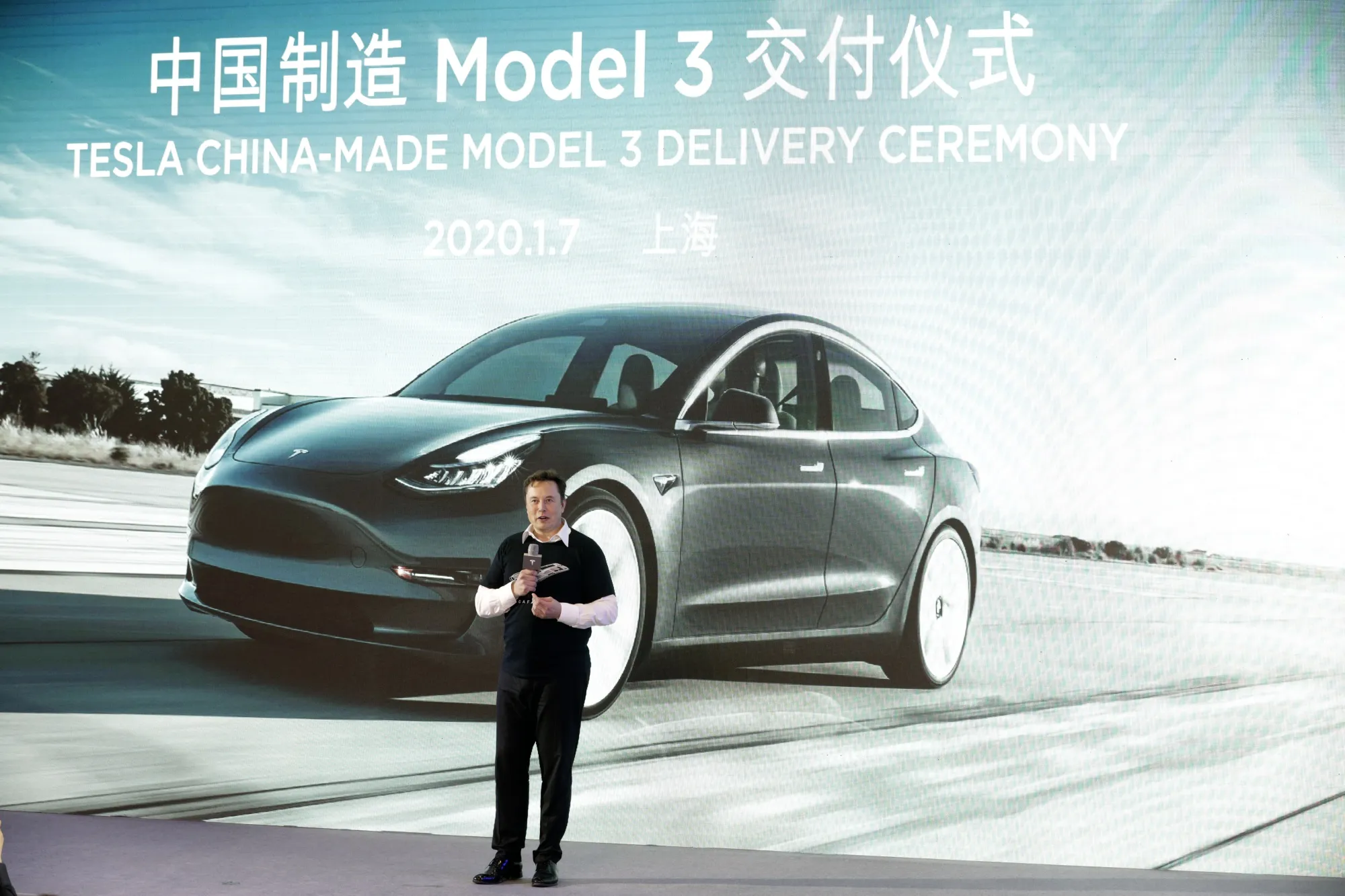 Elon Musk speaks during a Tesla China-Made Model 3 delivery ceremony in Shanghai, in Jan.