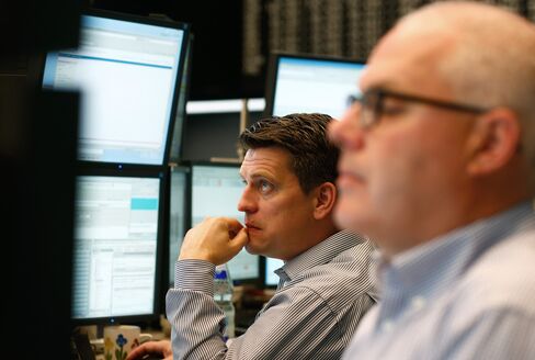 Traders Monitor Data at the Frankfurt Stock Exchange
