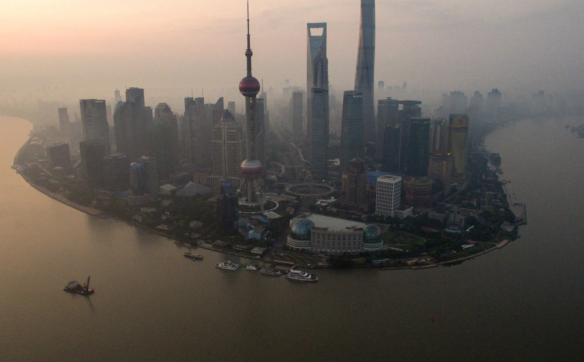 TOPSHOT - A general view shows the financial district of Lujiazui in Shanghai early on June 23, 2016.  / AFP PHOTO / JOHANNES EISELE        (Photo credit should read JOHANNES EISELE/AFP/Getty Images)