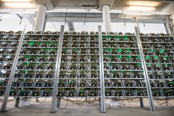 Cryptocurrency mining rigs composed of Antminer S9 ASIC machines operate on racks at the HydroMiner GmbH cryptocurrency mining facility near Waidhofen an der Ybbs, Austria.