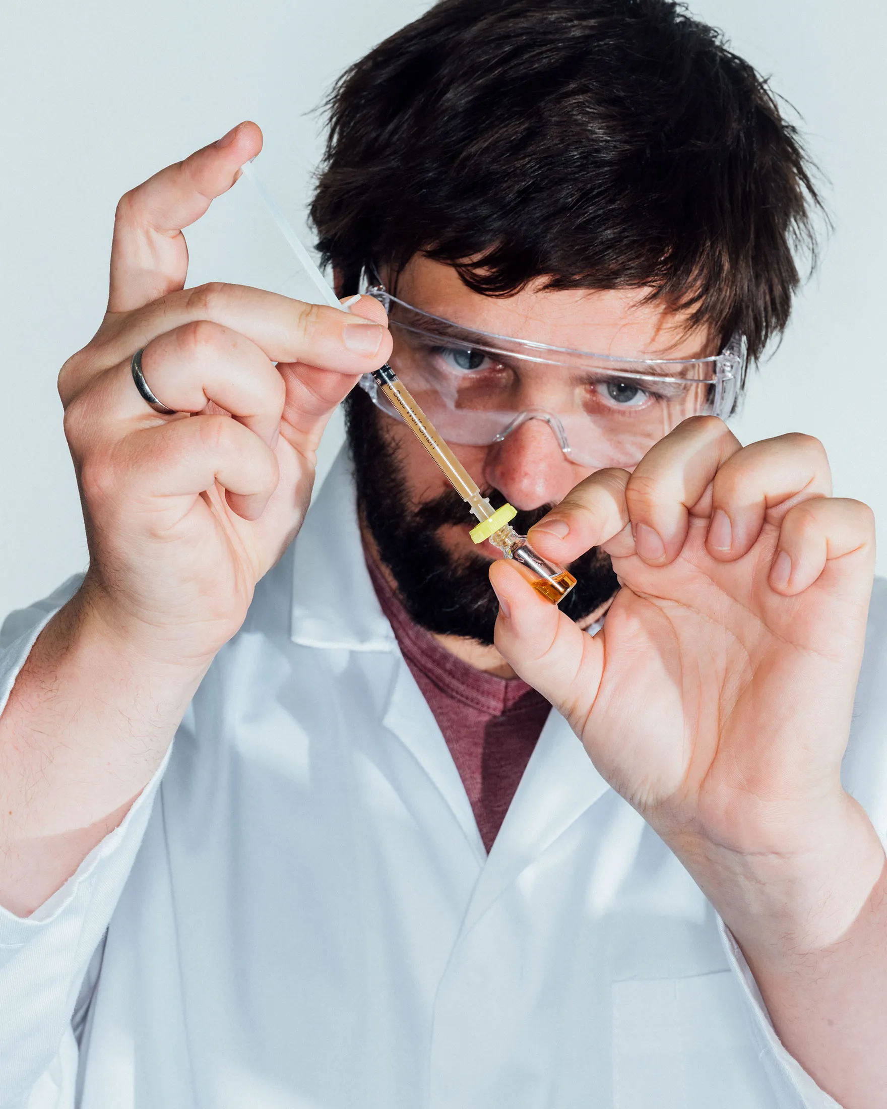 Scientist Joel Thogersen tests a vial of bacteria at MicroHarvest's laboratory in Hamburg, Germany on March 23, 2023.&nbsp;
