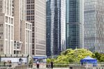 A resident at a Covid-19 testing booth in Pudong's Lujiazui Financial District in Shanghai on June 20.