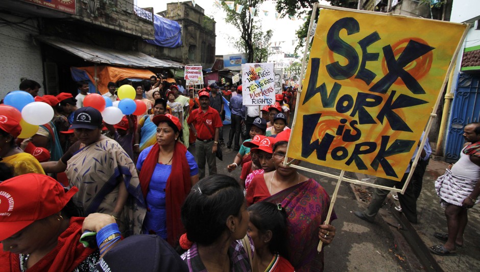 Sex workers and supporters rally in India. A study done in the U.K. focuses on the high job satisfaction of sex workers there.