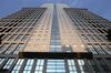 The building housing the Deutsche Bank AG offices stands in Tokyo, Japan, on Wednesday, Dec. 4, 2013. Deutsche Bank's Japanese brokerage unit will probably be penalized by local regulators for breaching rules over excessive spending to entertain clients, two people with knowledge of the matter said.