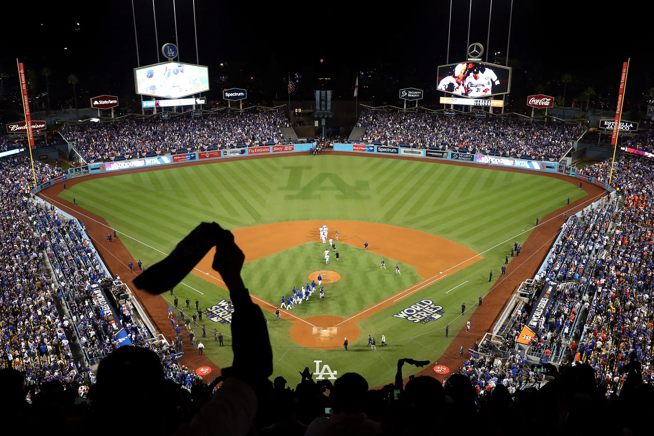 LOS ANGELES, CA - OCTOBER 31:  The Los Angeles Dodgers celebrate after defeating the Houston Astros 3-1 in game six of the 2017 World Series at Dodger Stadium on October 31, 2017 in Los Angeles, California.  (Photo by Joe Scarnici/Getty Images)