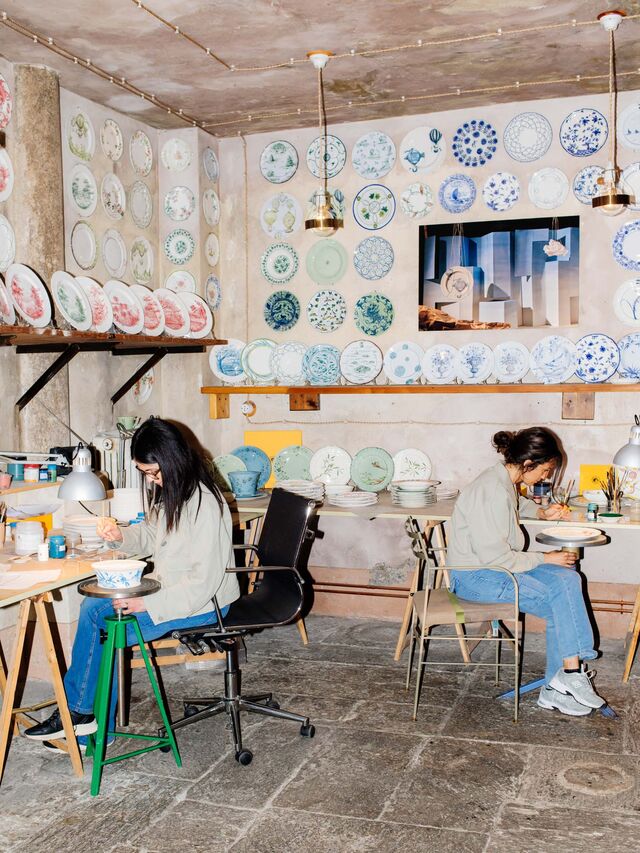 A person holds a tea set from the Maana Atelier, which offers small-group workshops for everything from botanical teas to earthen wall art.