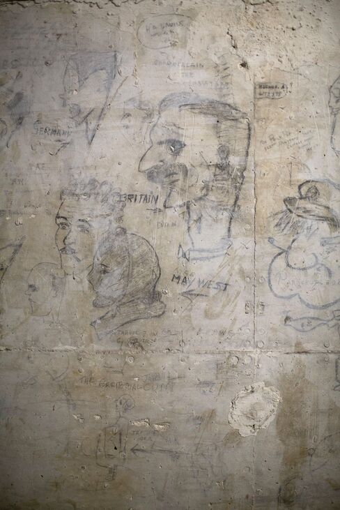 The vaults are decorated with World War II–era graffiti.