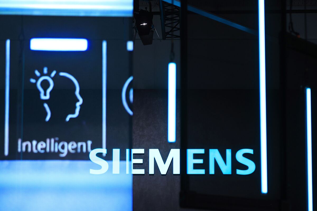 bloomberg.com - Marilen Martin - Siemens Says Industry's Demands Keep It Safe From AI Disruption