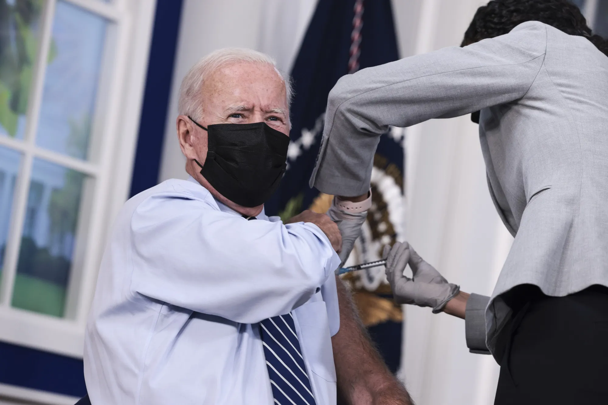 President Joe Biden receives a third Covid-19 vaccine dose&nbsp;in September 2021.