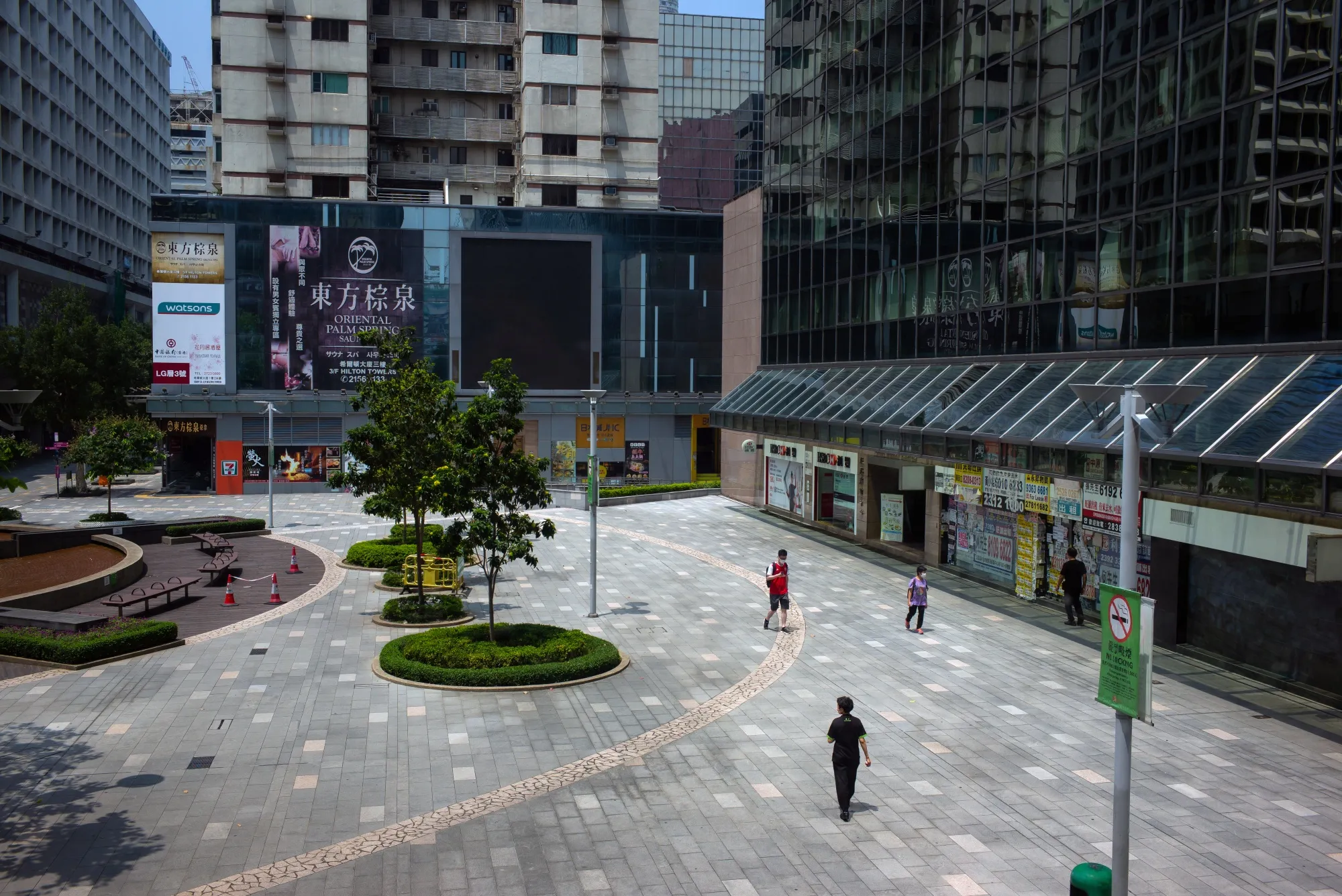 A quiet plaza by&nbsp;commercial buildings in Hong Kong, China, on July 31.