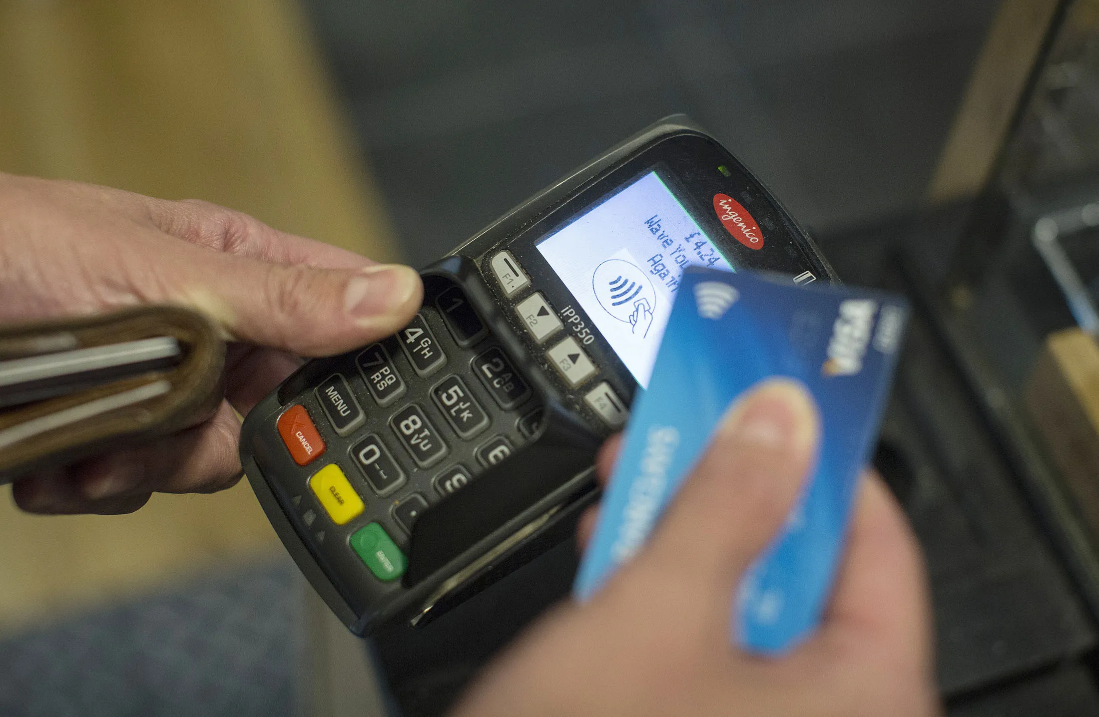 Customers Pay With Contactless Cards