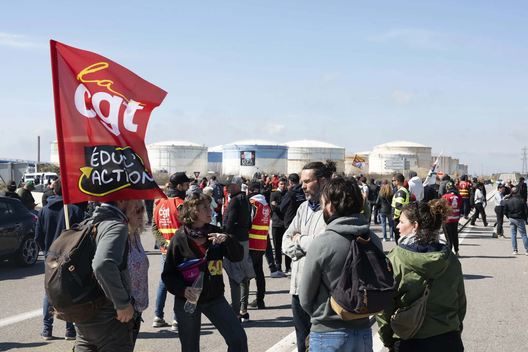 Striking members of the General Confederation of Labour (CGT) and other unions block the road to oil refineries in the industrial and port area of Fos-sur-Mer, France, on March 22.