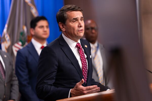 Department Of Justice And International Law Enforcement Hold News Conference