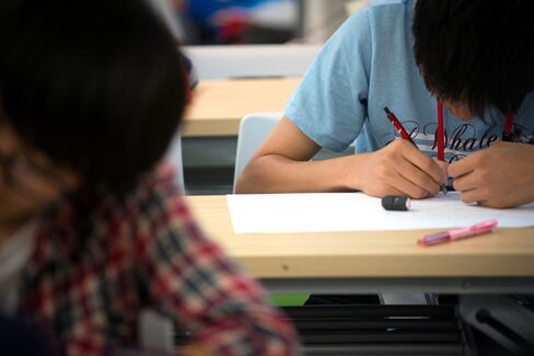 Students attend a free cram class in Tokyo.