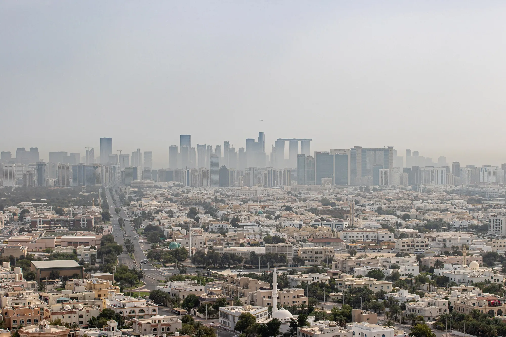 Residential and commercial skyscrapers on the city skyline in Abu Dhabi.