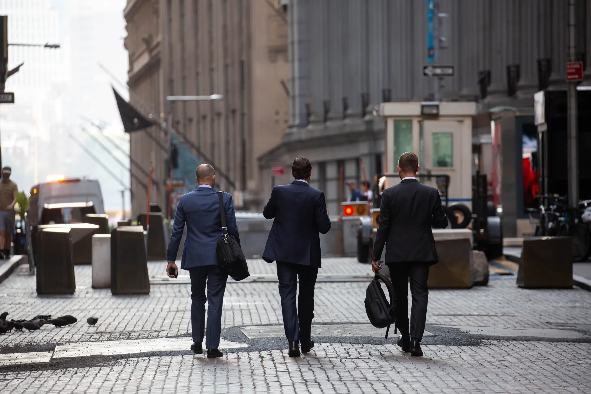 Workers return to the office on&nbsp;Wall Street in New York.