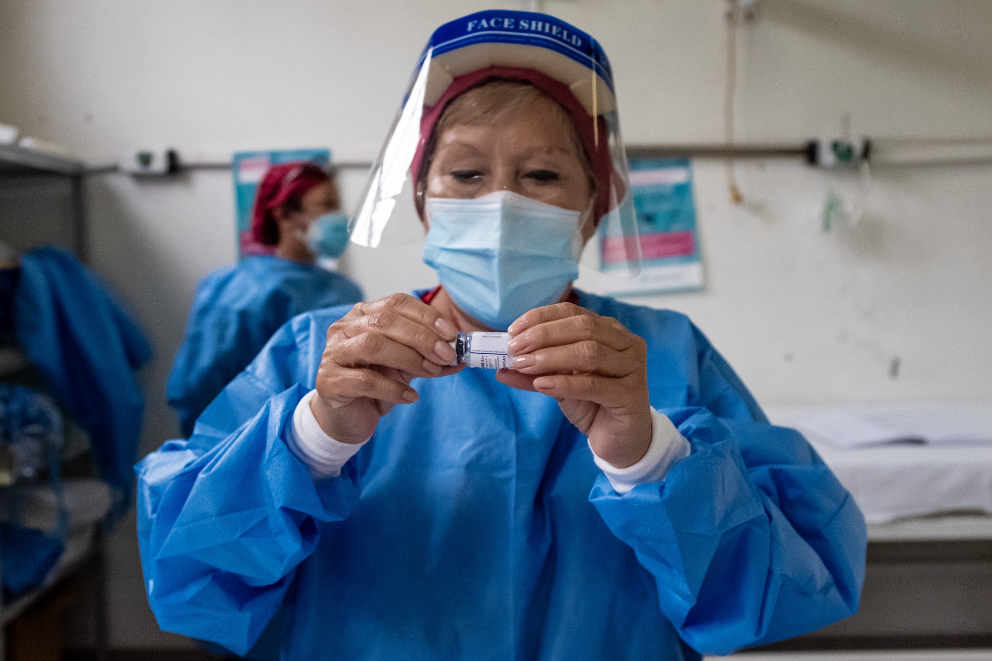A healthcare worker prepares a dose of the Russian Sputnik V Covid-19 vaccine at a hospital in Buenos Aires, Argentina.