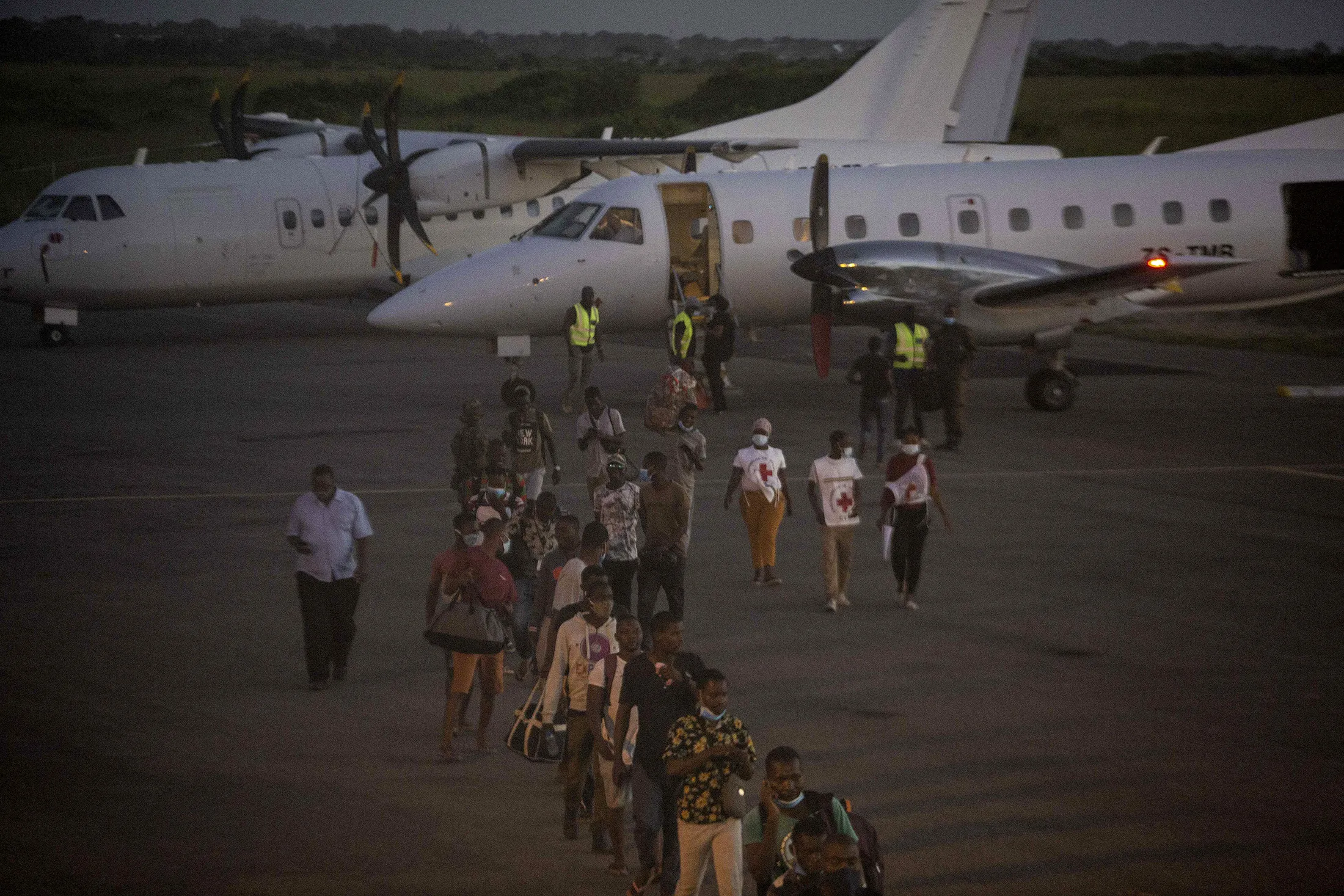 People evacuated from the city of Palma arrive on an humanitarian flight at the airport in Pemba on March 31.&nbsp;&nbsp;&nbsp;