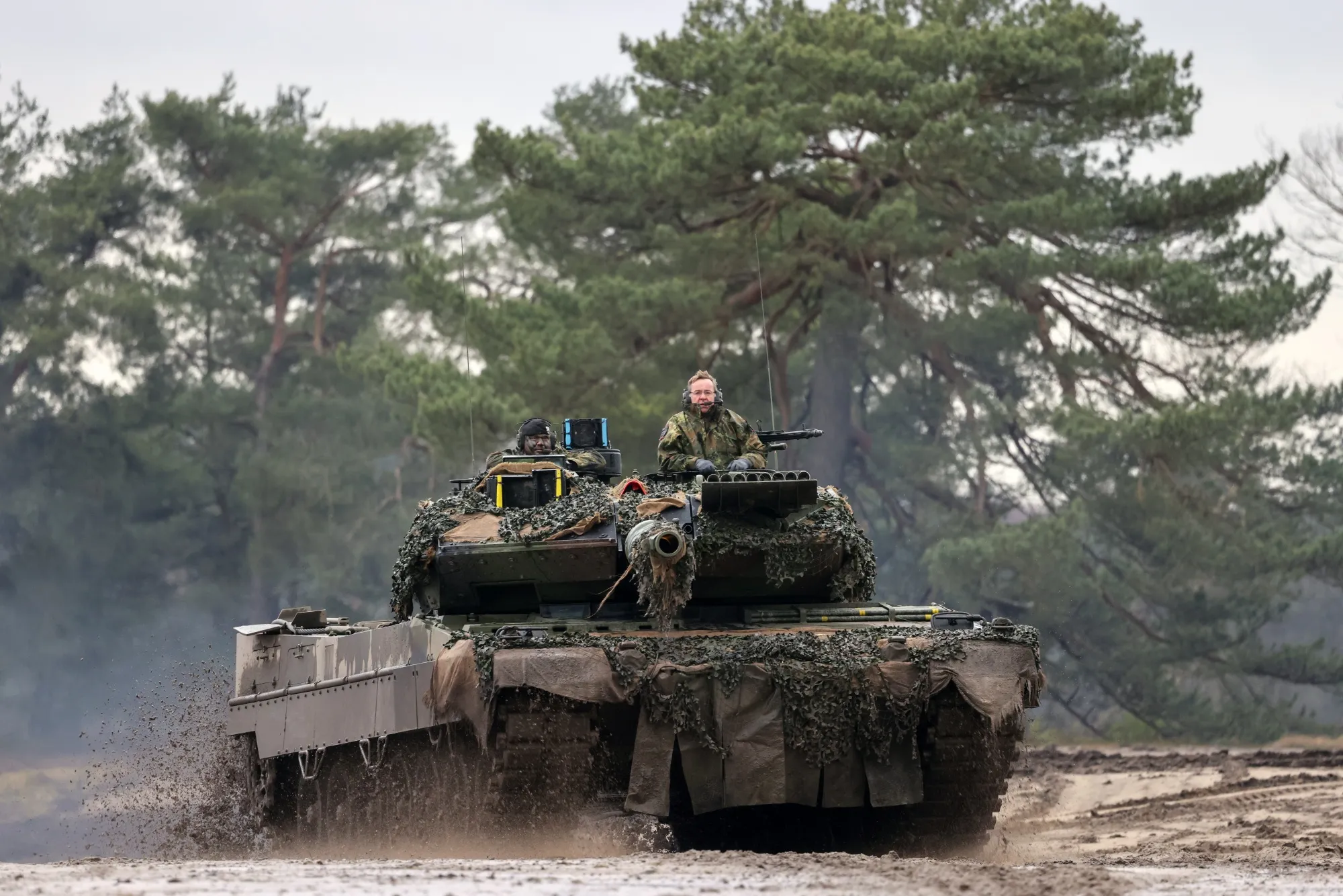 Boris Pistorius, Germany’s defense minister, rides in an Leopard 2 A6 battle tank.