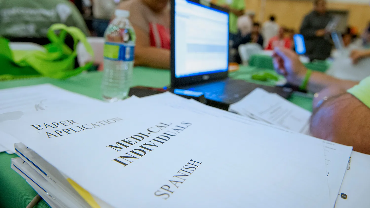Applications for Medi-Cal health insurance sits on a table during the WeConnect Health Enrollment Information and Wellness Event in Oakland, California, U.S., on Saturday, Sept. 21, 2013.
