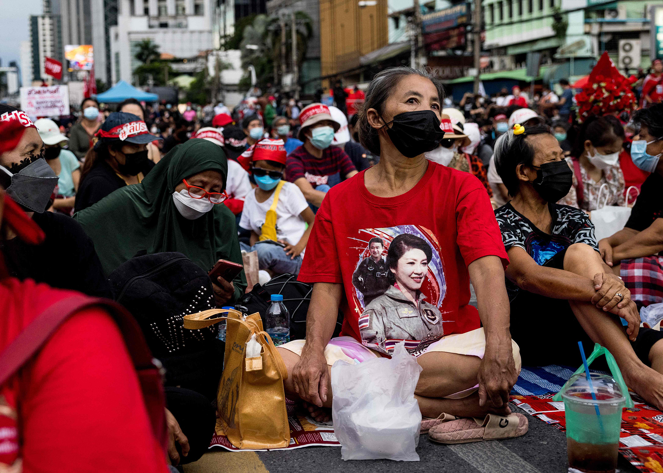 A protester wears a t-shirt featuring Thaksin and Yingluck Shinawatra during a demonstration in Bangkok on Sept. 2.