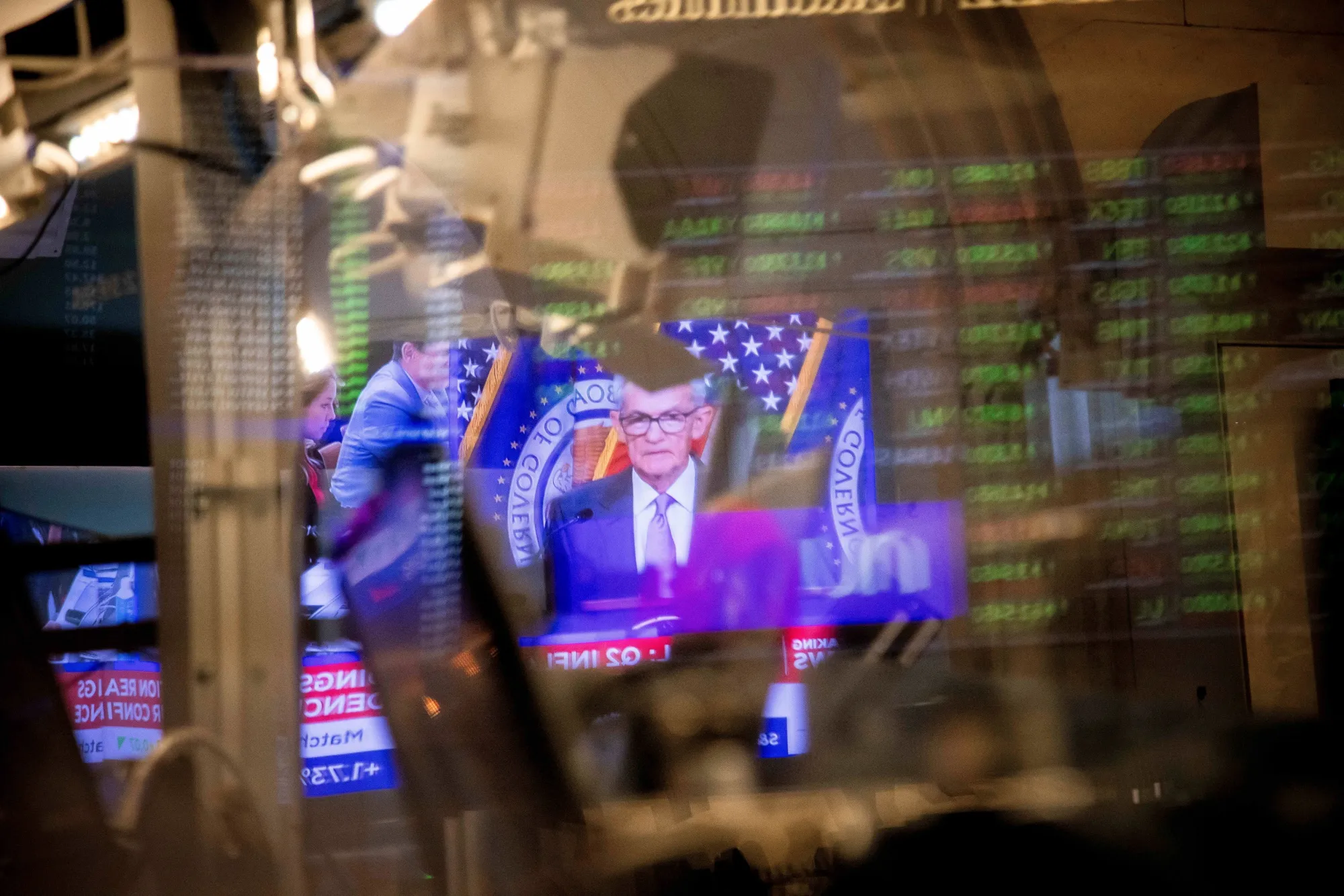 A television station broadcasts Jerome Powell, chairman of the US Federal Reserve, speaking on the floor of the New York Stock Exchange.