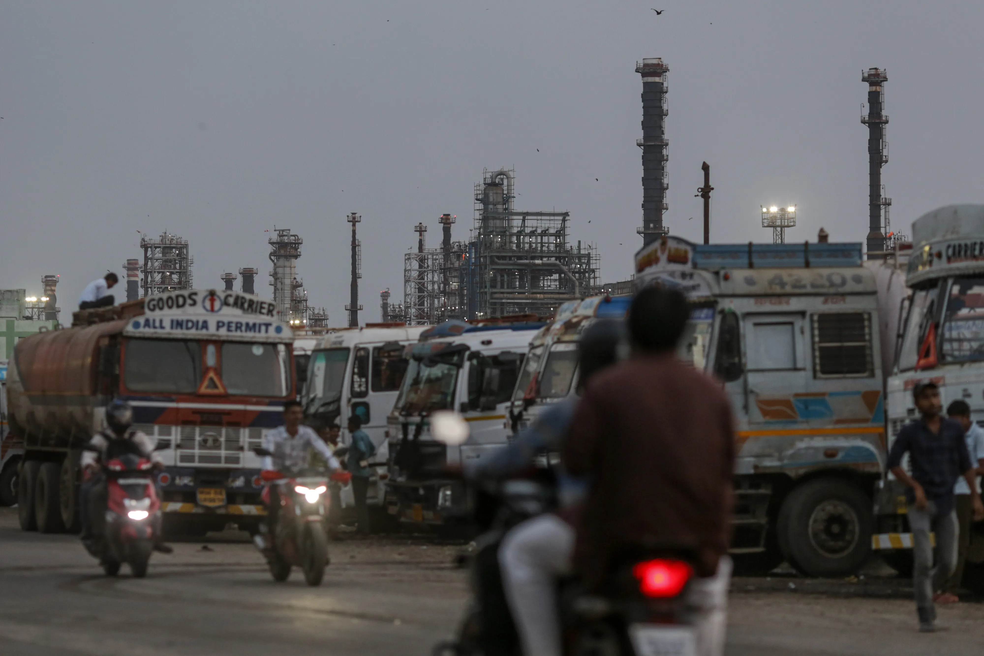 Oil tanker trucks outside an oil refinery&nbsp;in Mumbai, India.