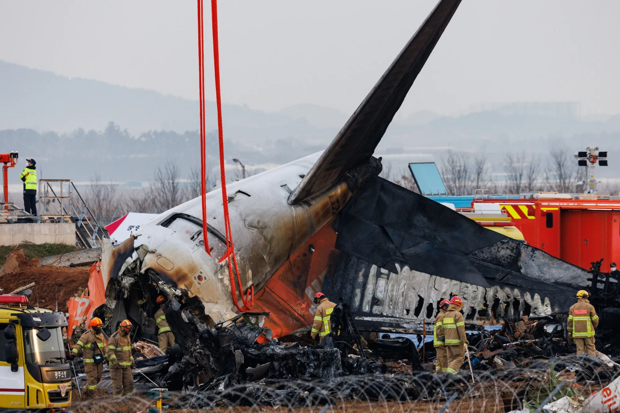 The wreckage of Jeju Air Co. Flight 2216 at Muan International Airport.