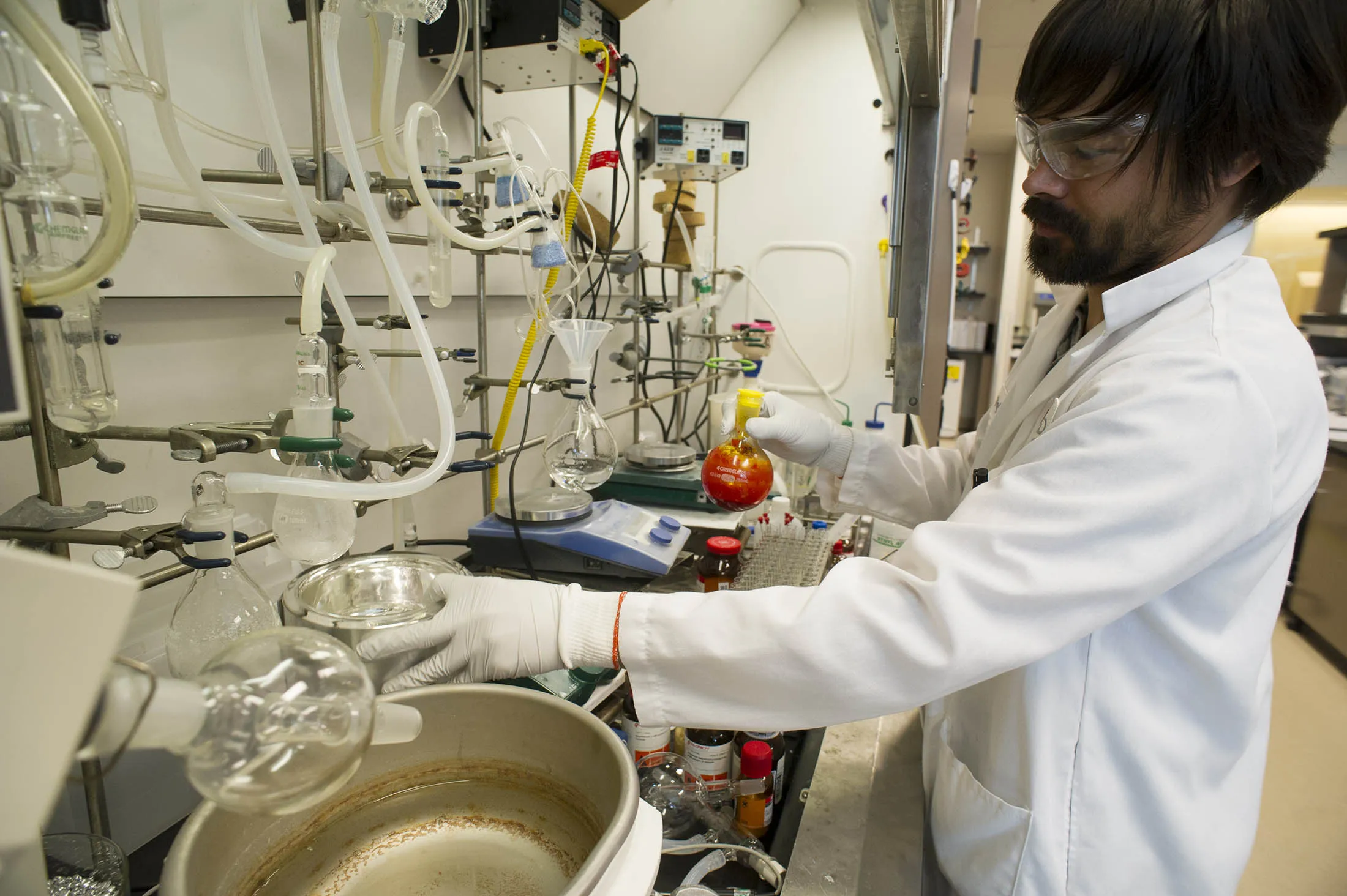 A scientist for Gilead Sciences works on a potential hepatitis C virus drug candidate.
