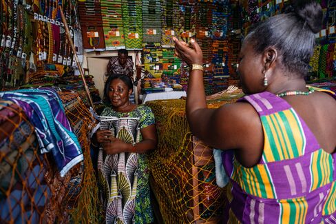 Bolts of GTP cloth, made by the Dutch luxury fabric company Vlisco, shown in a store owned by Perpetual Owusu-Agyemang. She’s seen counterfeit versions selling for a fraction of the wholesale price, just down the road.