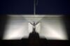 An eagle sculpture stands on the facade of the Marriner S. Eccles Federal Reserve building in Washington.