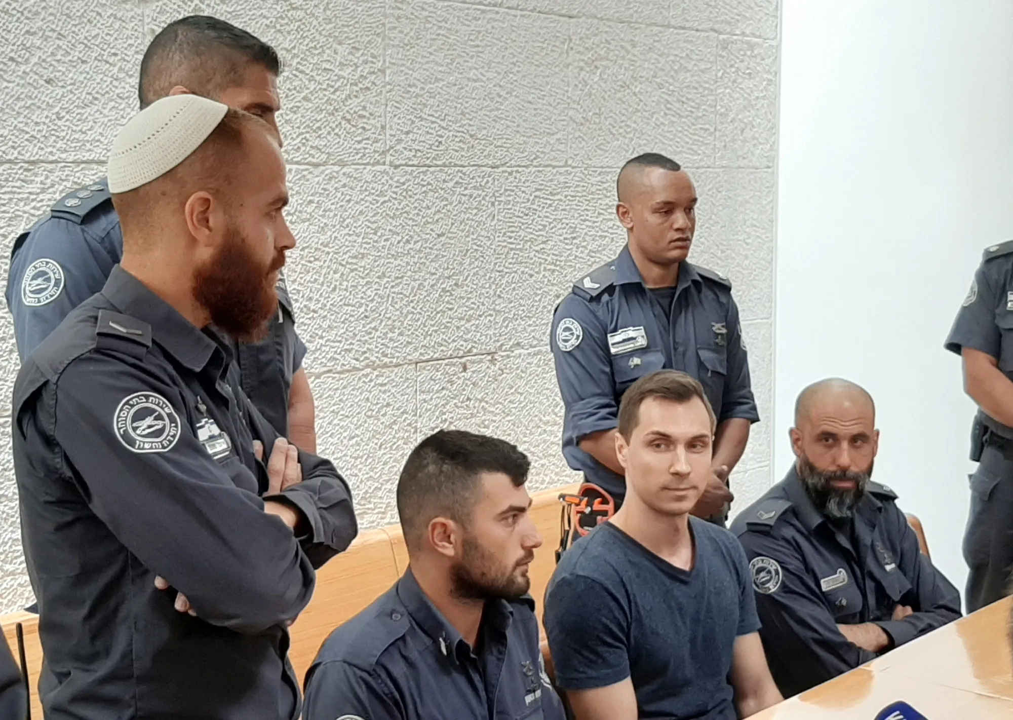 Alexei Burkov, seated, at the High Court of Justice in Jerusalem on Nov. 3.