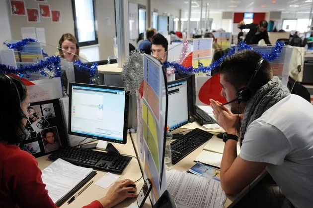 Employees of call center Webhelp in Etrelles, France