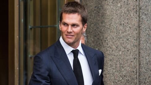 New England Patriots quarterback Tom Brady leaves federal court after appealing the National Football League's (NFL) decision to suspend him for four games of the 2015 season on August 12, 2015 in New York City.