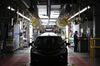 Camry vehicles move through final inspection after coming off the assembly line at the Toyota Motor Corp. manufacturing plant in Georgetown, Kentucky, U.S., on Thursday, Aug. 29, 2019. Retrofitting a Camry sedan assembly line for the RAV4 SUV is part of a company mandate to update Toyota's oldest North American plant with newer technology, more efficient processes, and fresher products.