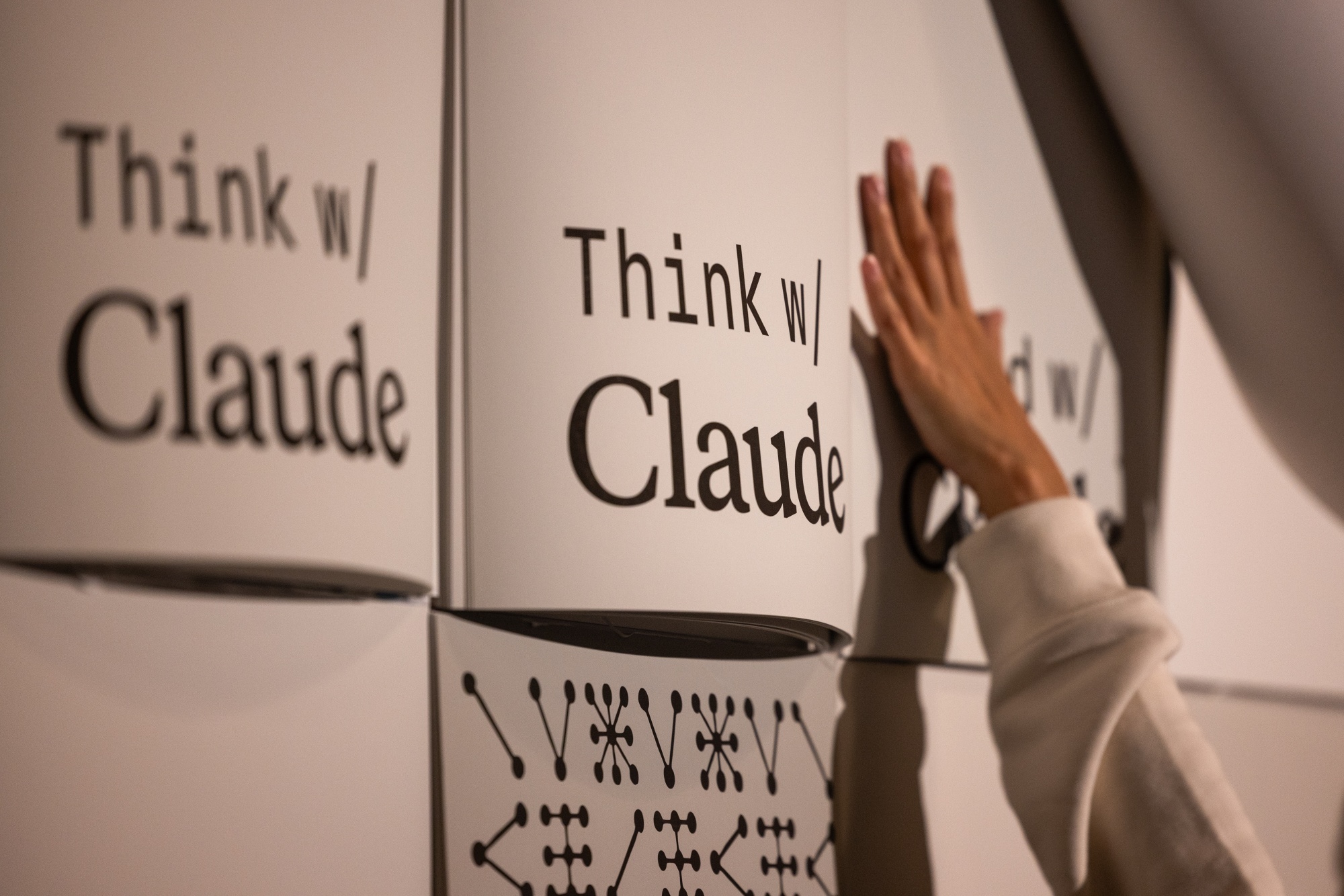 Branding for Claude Code on removable posters at Anthropic PBC's Code with Claude developer conference in London, UK, on Tuesday, May 19, 2026. Anthropic is in early talks with investors to raise at least $30 billion in fresh financing, according to people familiar with the matter, setting the stage for what could be its largest funding round yet.