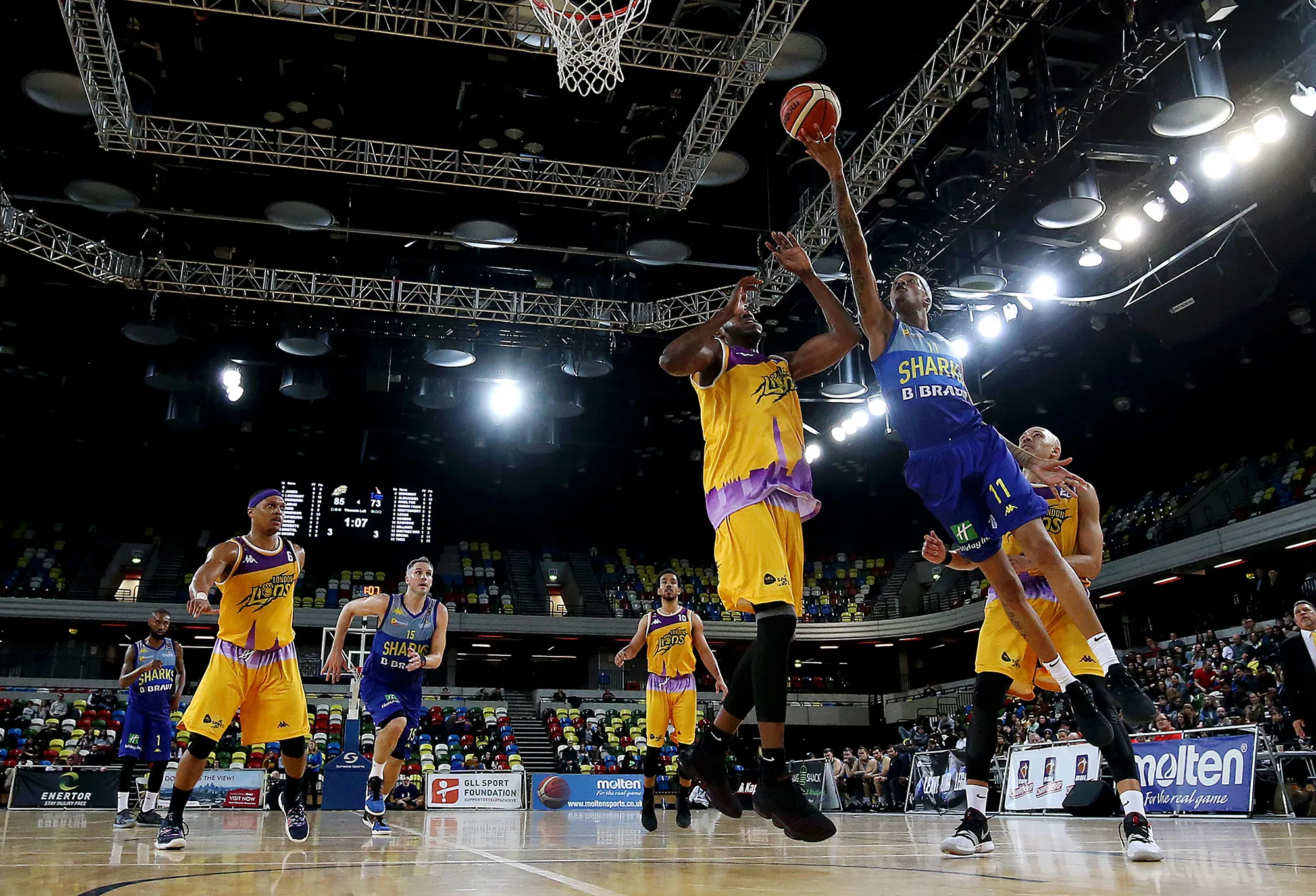 Dirk Williams lays the ball up during a British Basketball League game between the London Lions and the Sheffield Sharks in London in 2019.