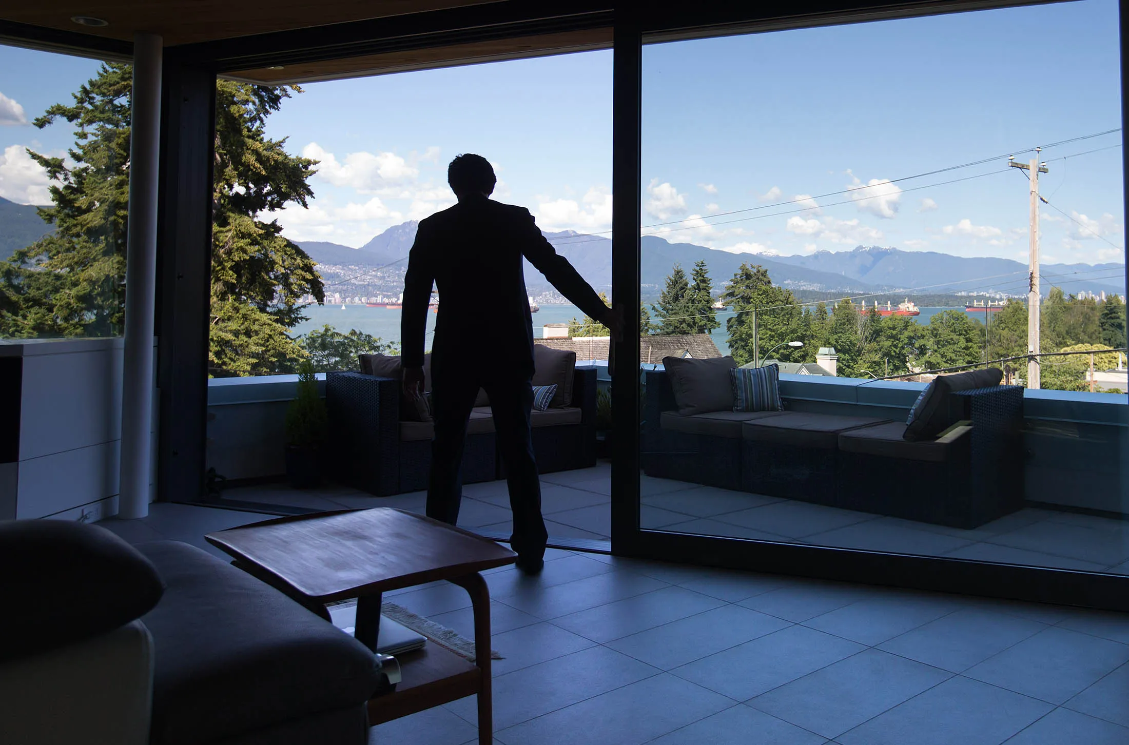 Realtor Lorne Goldman stands in the master bedroom of a home for sale listed at C$7.89 million in the Point Grey neighborhood of Vancouver, British Columbia, Canada, on Friday, June 17, 2016. Vancouver has long been one of the world's most expensive places to live but price gains have reached a whole new level of intensity this year. Low interest rates, rising immigration, and a surge of foreign money—particularly from China—have all driven the increases.
