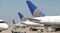 United Airlines jets at gates at O'Hare International Airport.