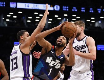 relates to Sabonis' 61st straight double-double sparks Kings' 107-77 rout of Nets