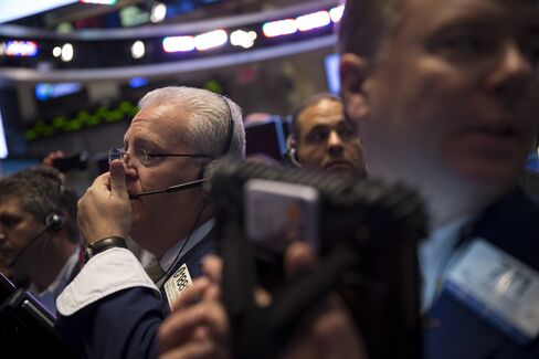 U.S. Stocks, Bonds Climb as Fed Officials Meet Amid Home Sales