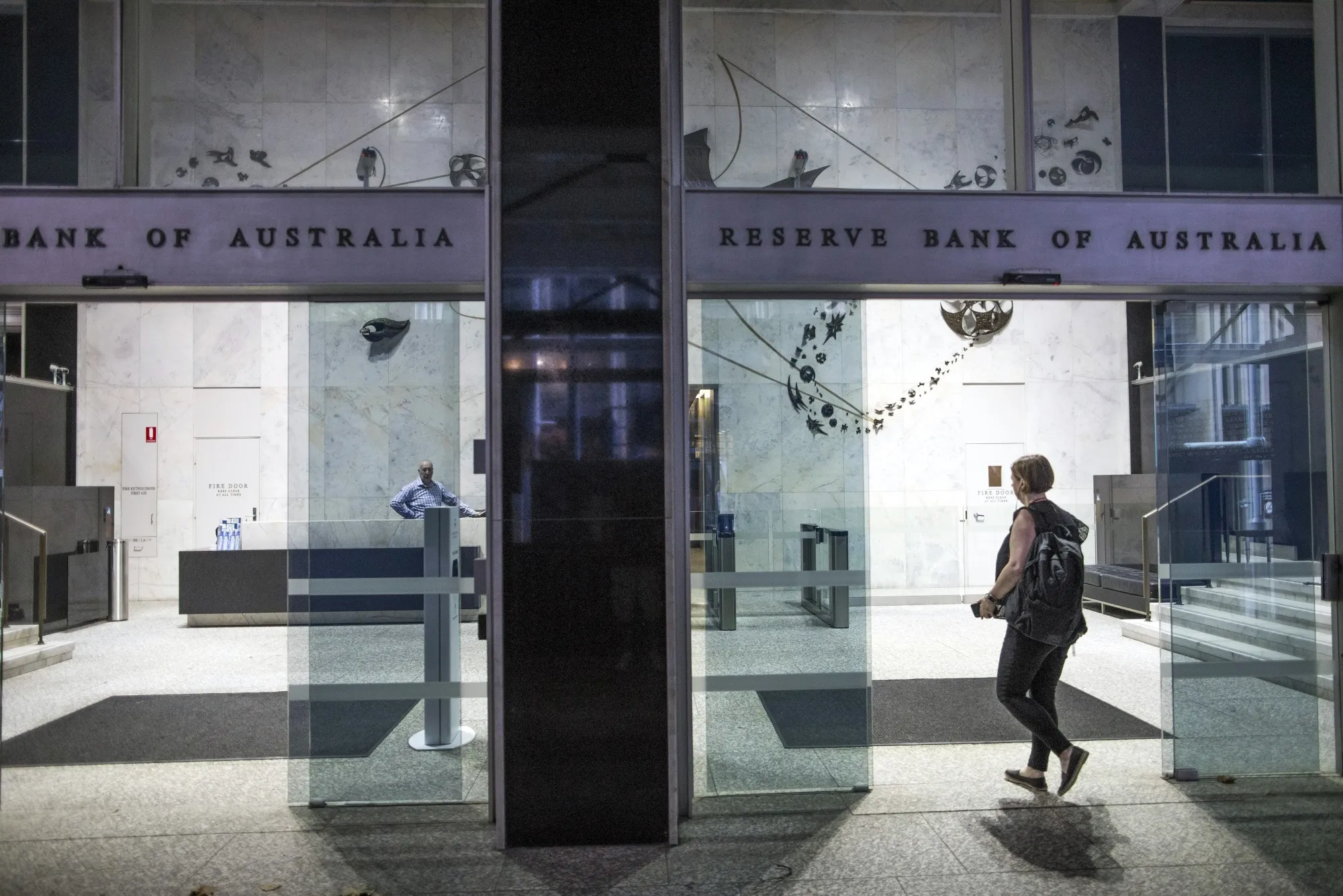 A person enters the Reserve Bank of Australia (RBA) building in Sydney.