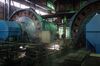 Workers stand next to machinery in the mineral selection shop at the Dongguashan Copper Mine, operated by Tongling Nonferrous Metals Group Co., in Tongling, Anhui province, China, on Thursday, Jan. 17, 2019. On the heels of record refined copper output last year, China's No. 2 producer, Tongling, says it'll defy economic gloom and strive to churn out even more of the metal in 2019.