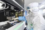 A technician works at a BGI Group laboratory in Wuhan, China.
Photographer: STR/AFP via Getty Images