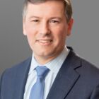Headshot of Aaron J Kennon