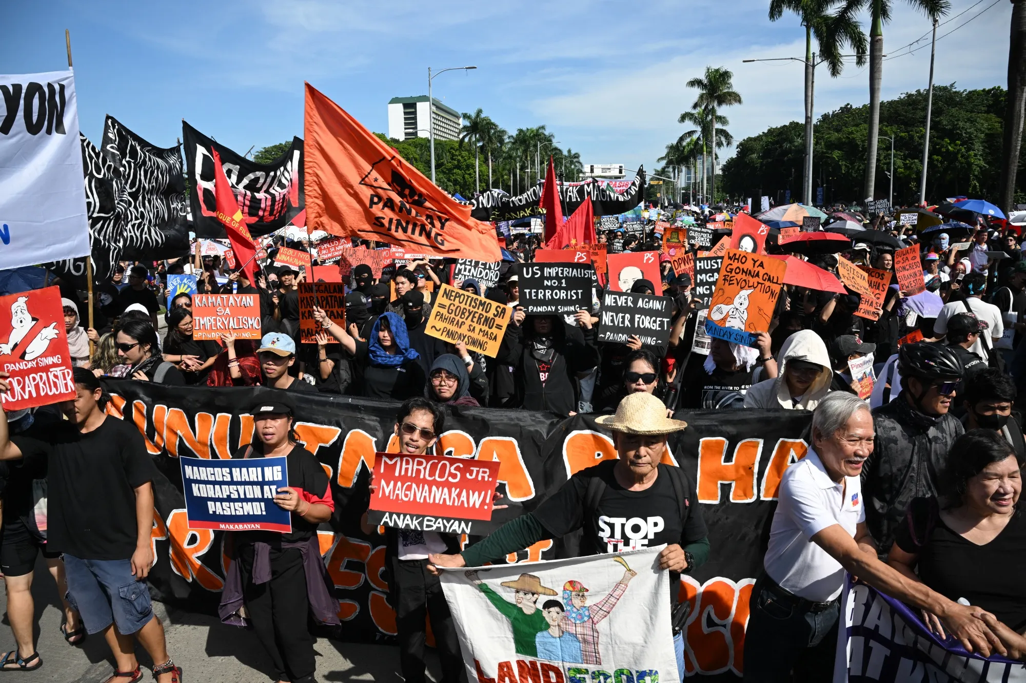 Protesters take part in a rally during a demonstration in Manila on Sept. 21.