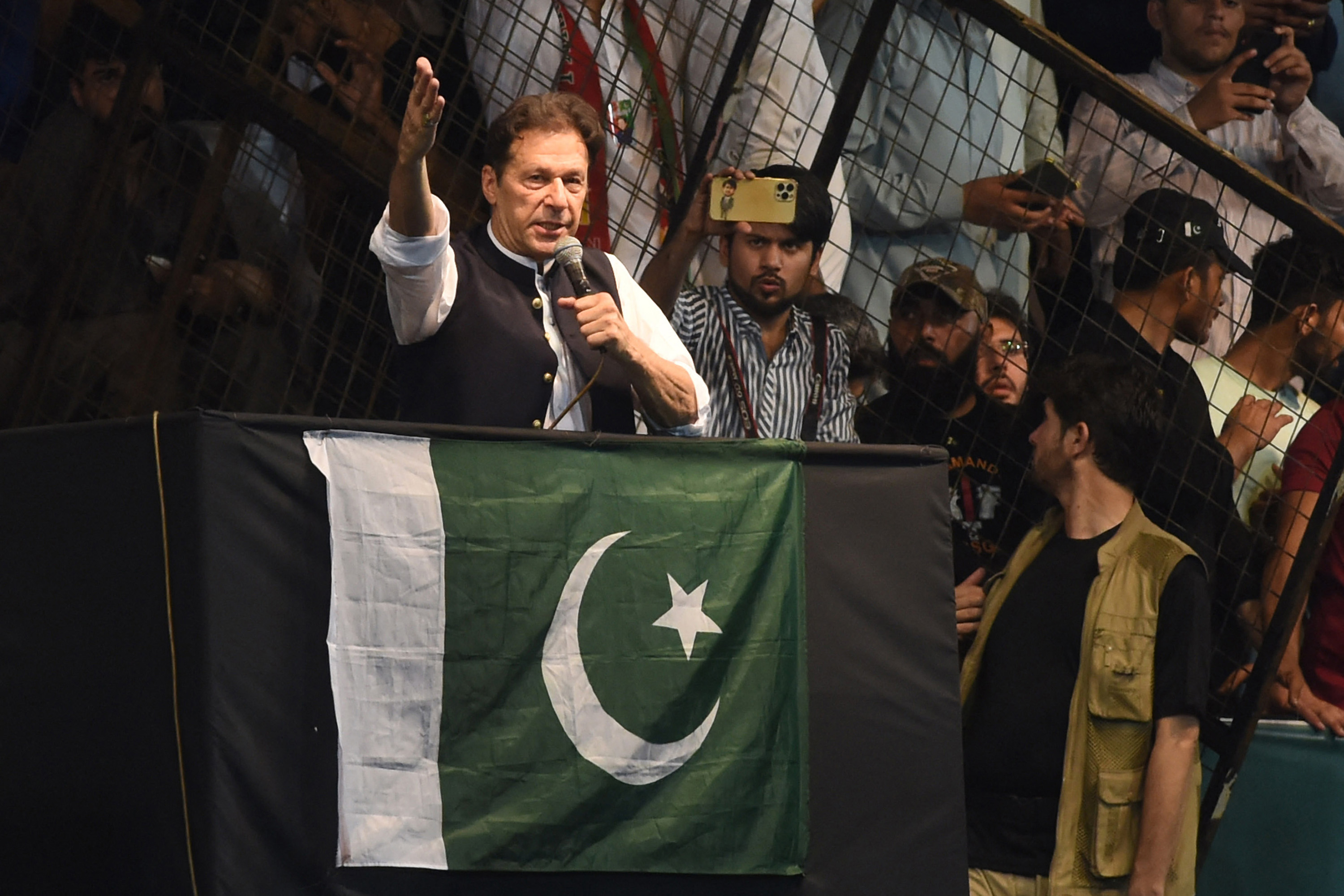 Imran Khan speaks to supporters at a rally in Lahore, Pakistan, on Aug. 13.