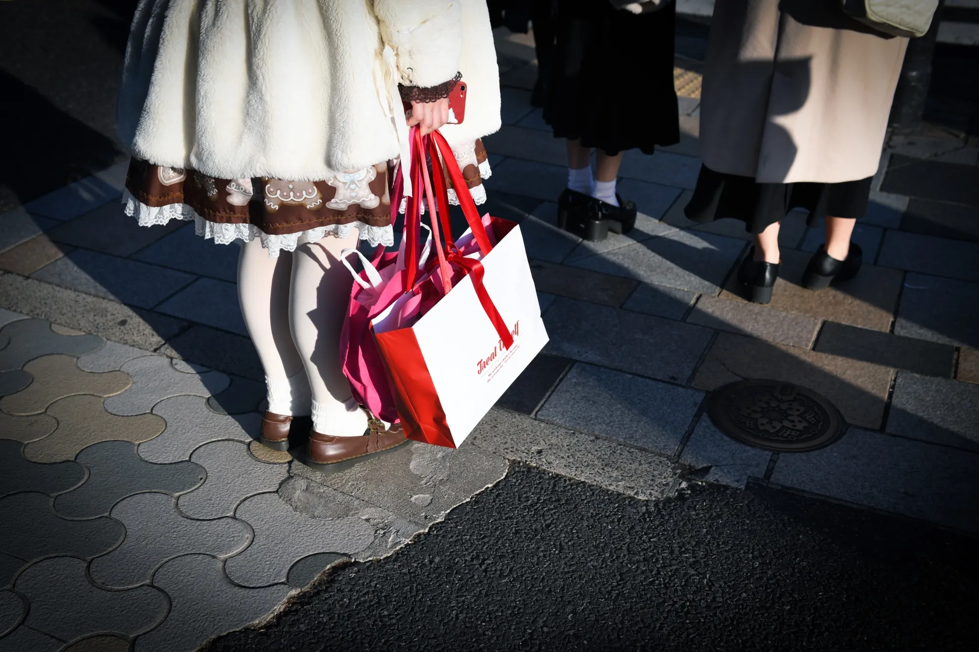 A shopper&nbsp;in the Omotesando area of Tokyo on Feb. 12.