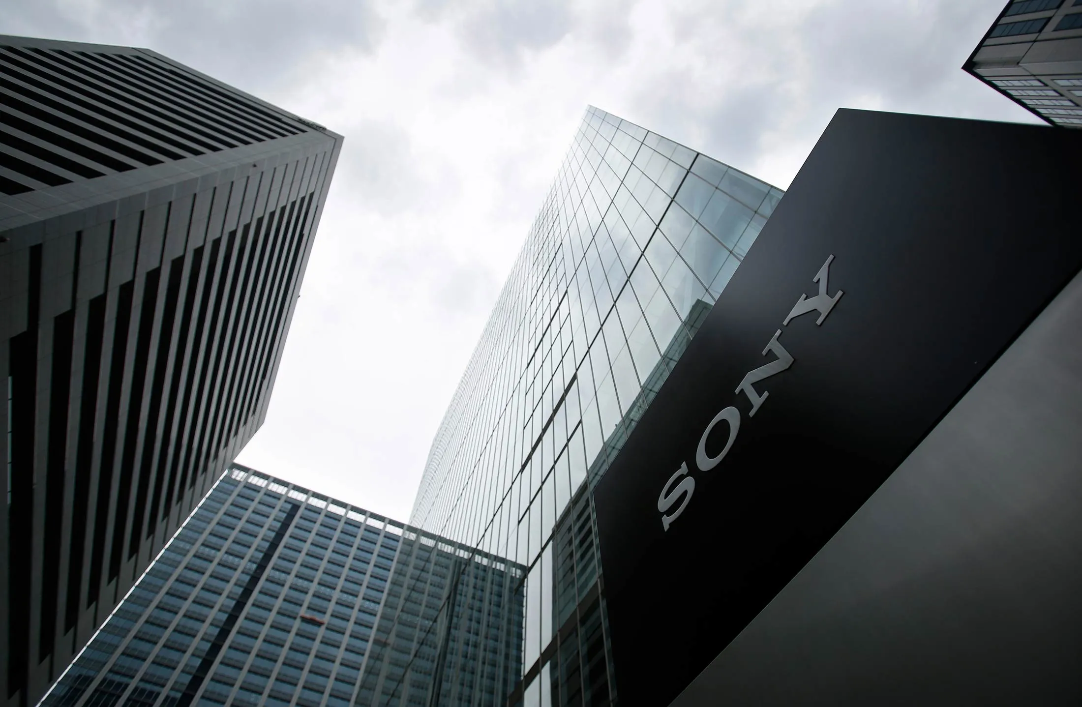 The Sony Corp. headquarters, center, stands in Tokyo, Japan, on Friday, Oct. 31, 2014.
