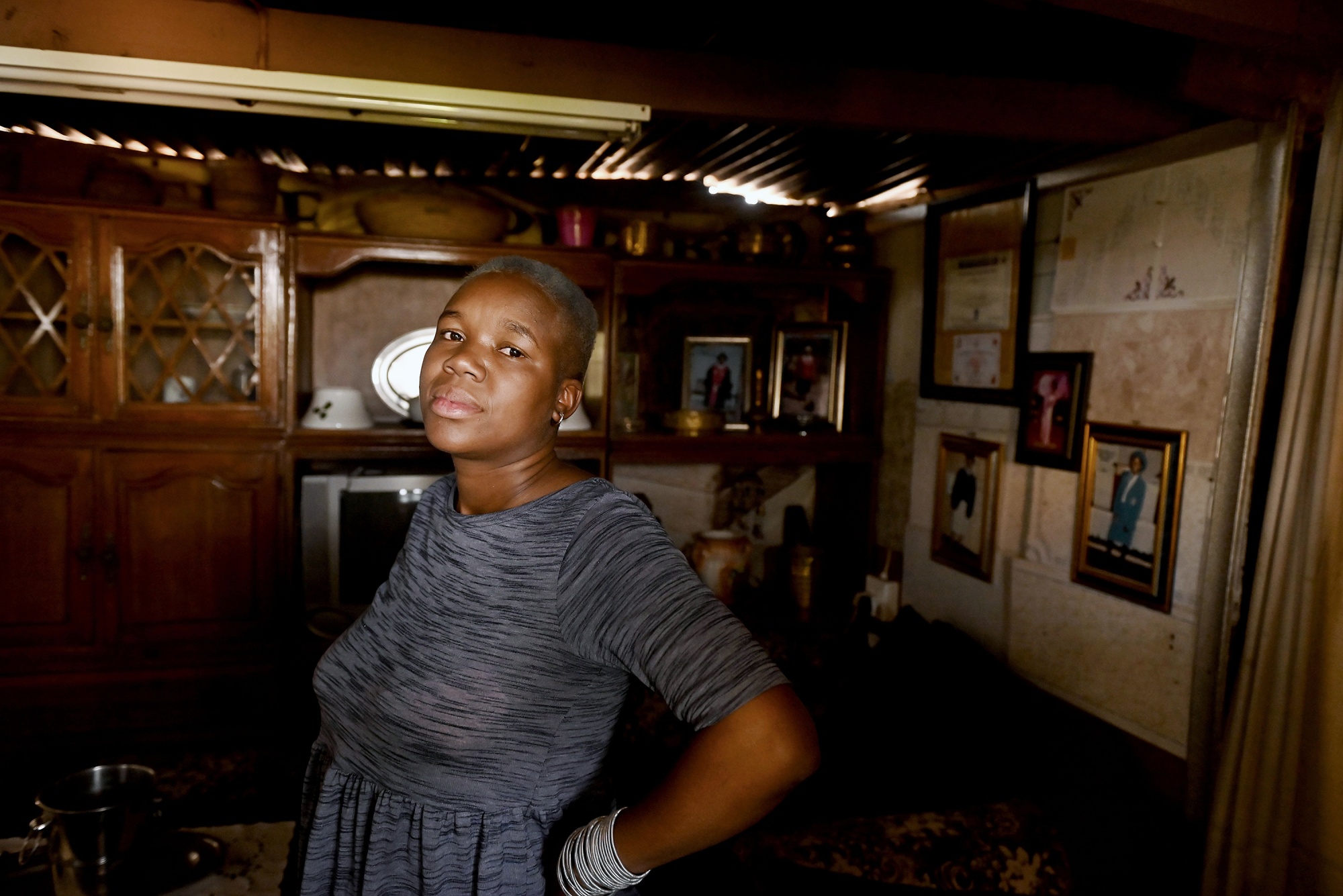 Lerato Molete in the two-room metal sheet home in Slovo Park that she shares with her uncle.
